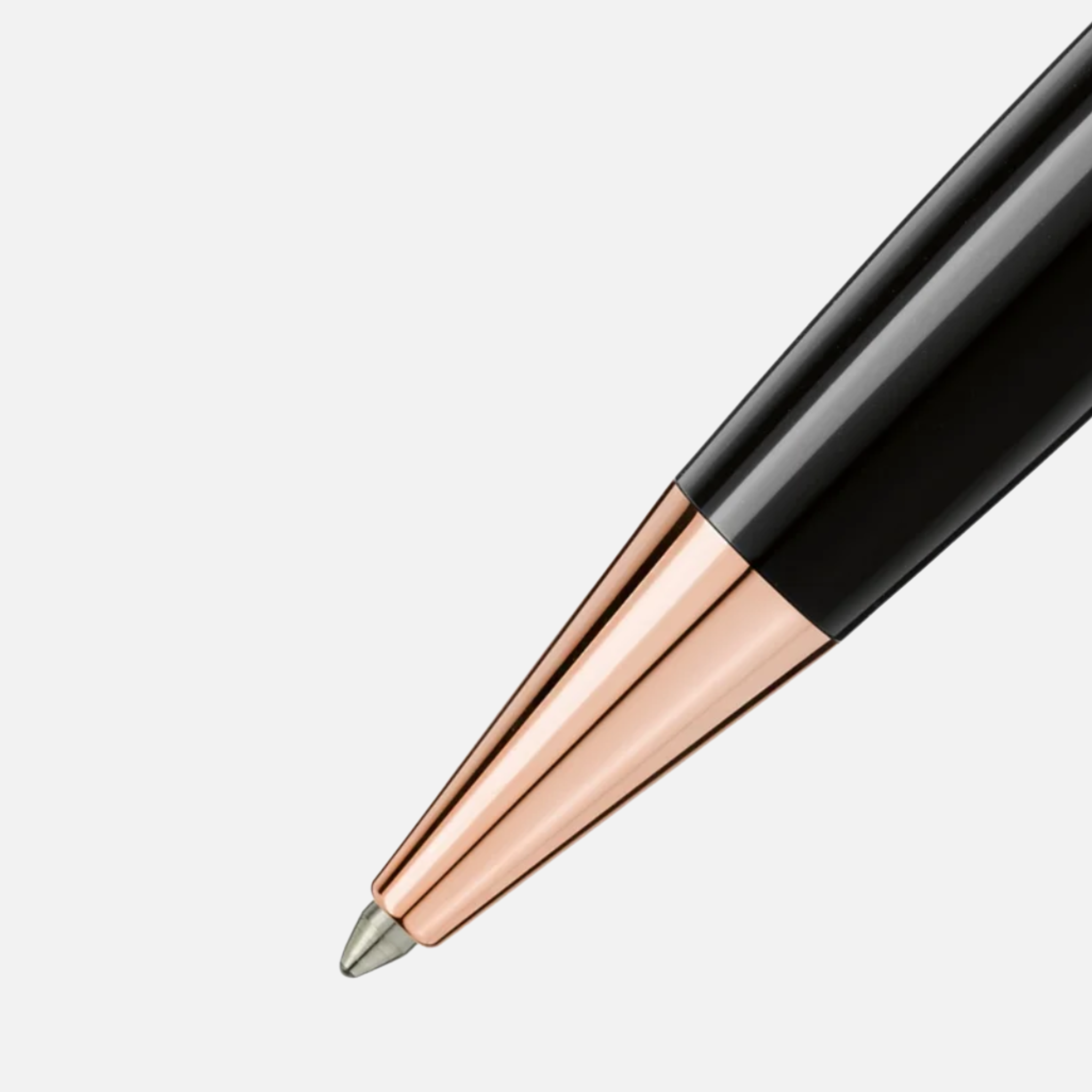 Penna a sfera Montblanc nera con finiture oro rosa e emblema bianco sul cappuccio