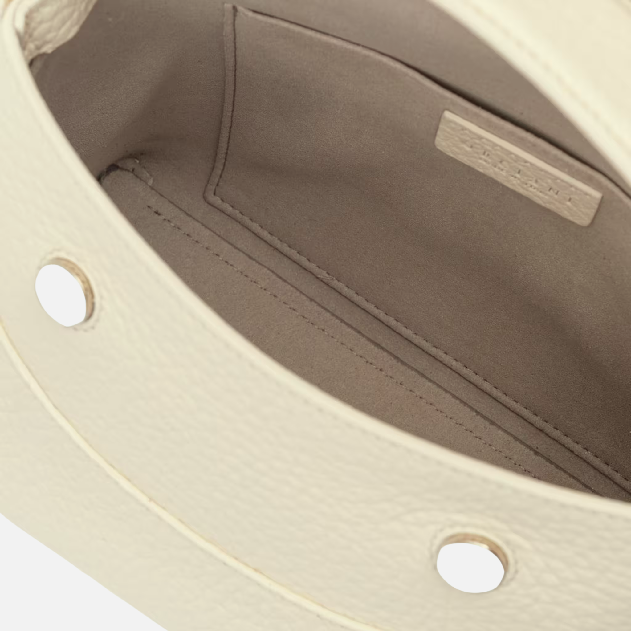 Interno borsa Orciani Nana Small Soft in tessuto beige con taschino interno e etichetta logo cucita