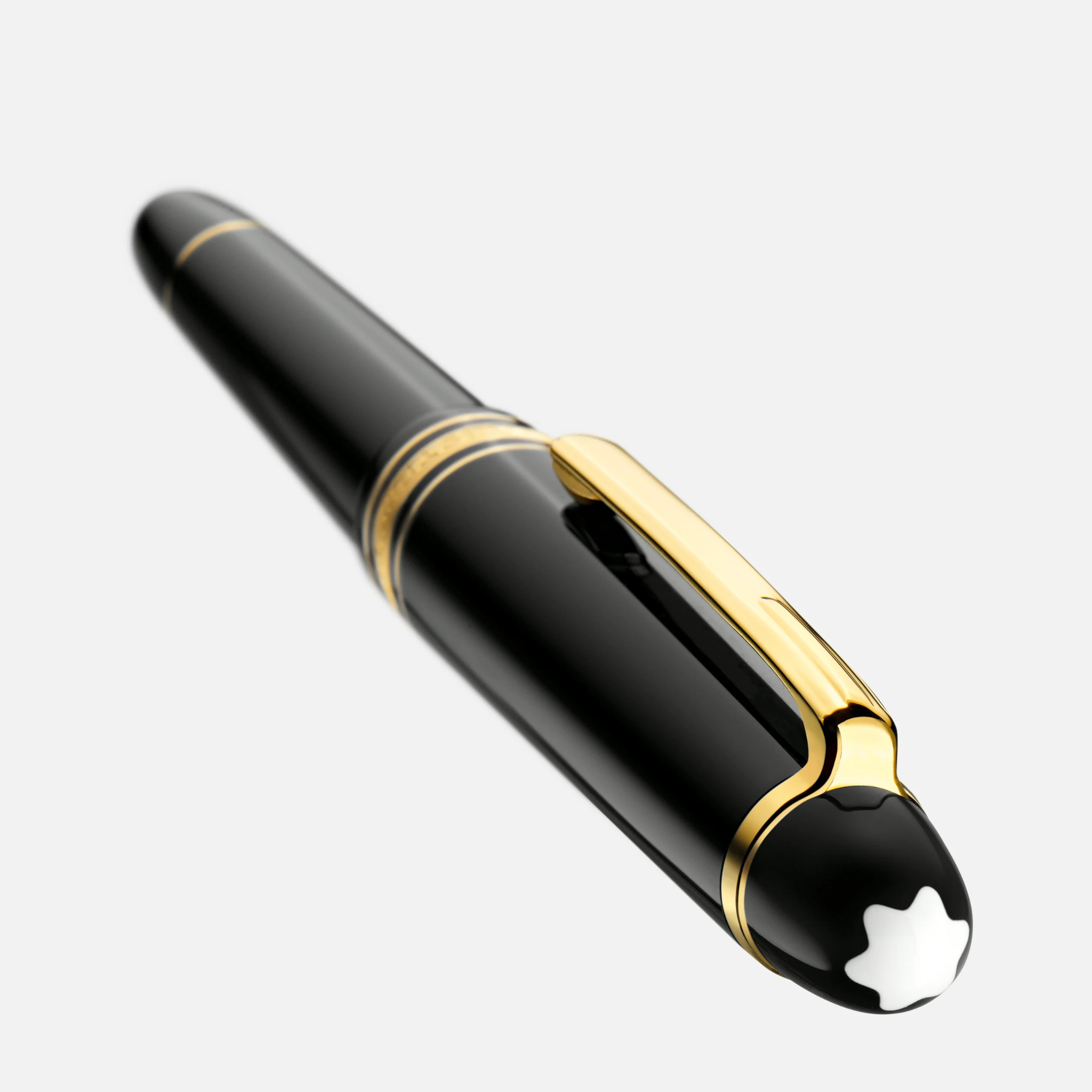 Stilografica Montblanc Meisterstück Classique Gold-Coated senza cappuccio, vista orizzontale con emblema bianco