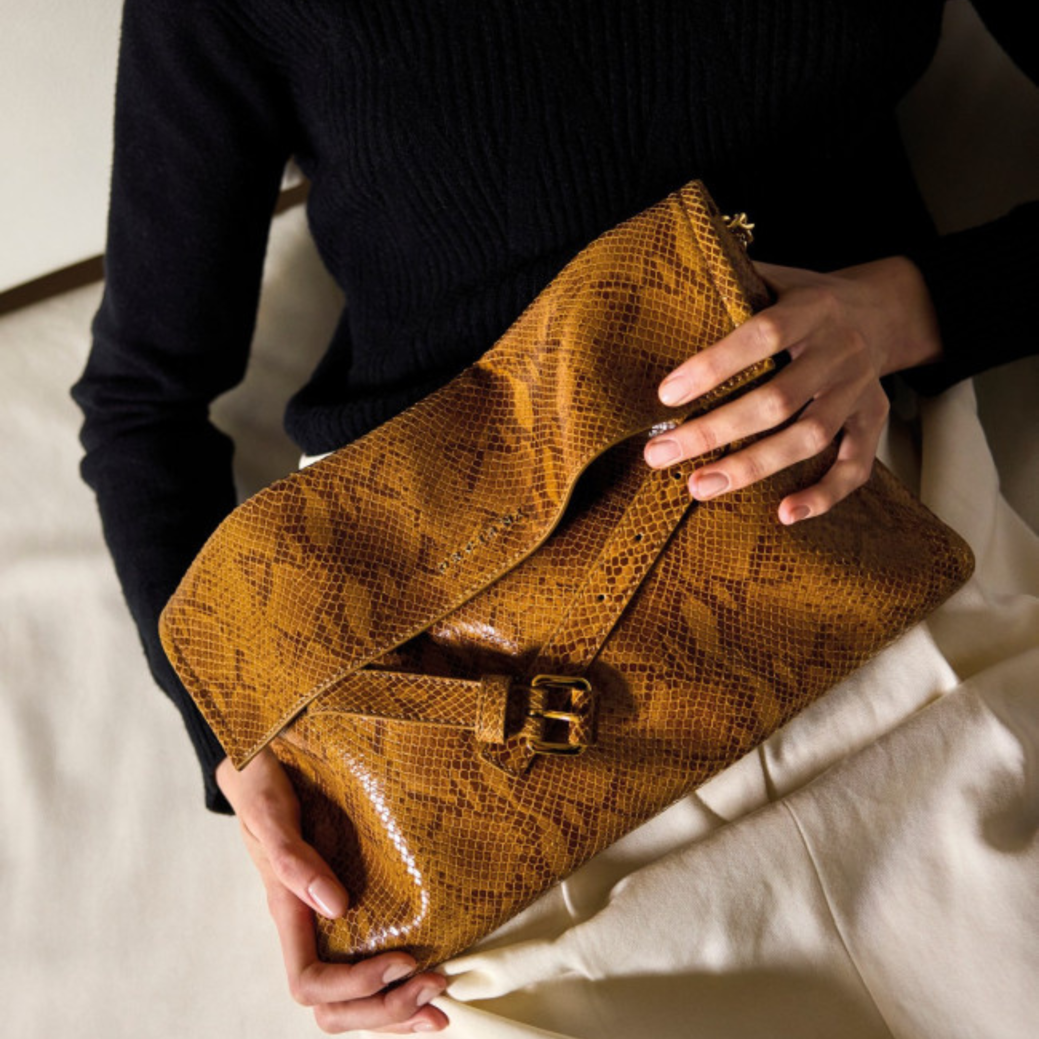 Borsa Venus Clutch Exotic Orciani in pelle effetto pitone marrone