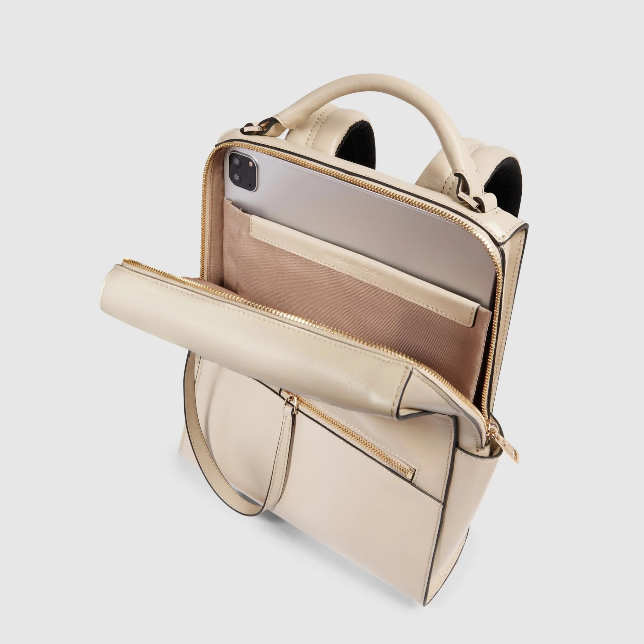 Interno zaino Piquadro pelle beige con tasca porta tablet