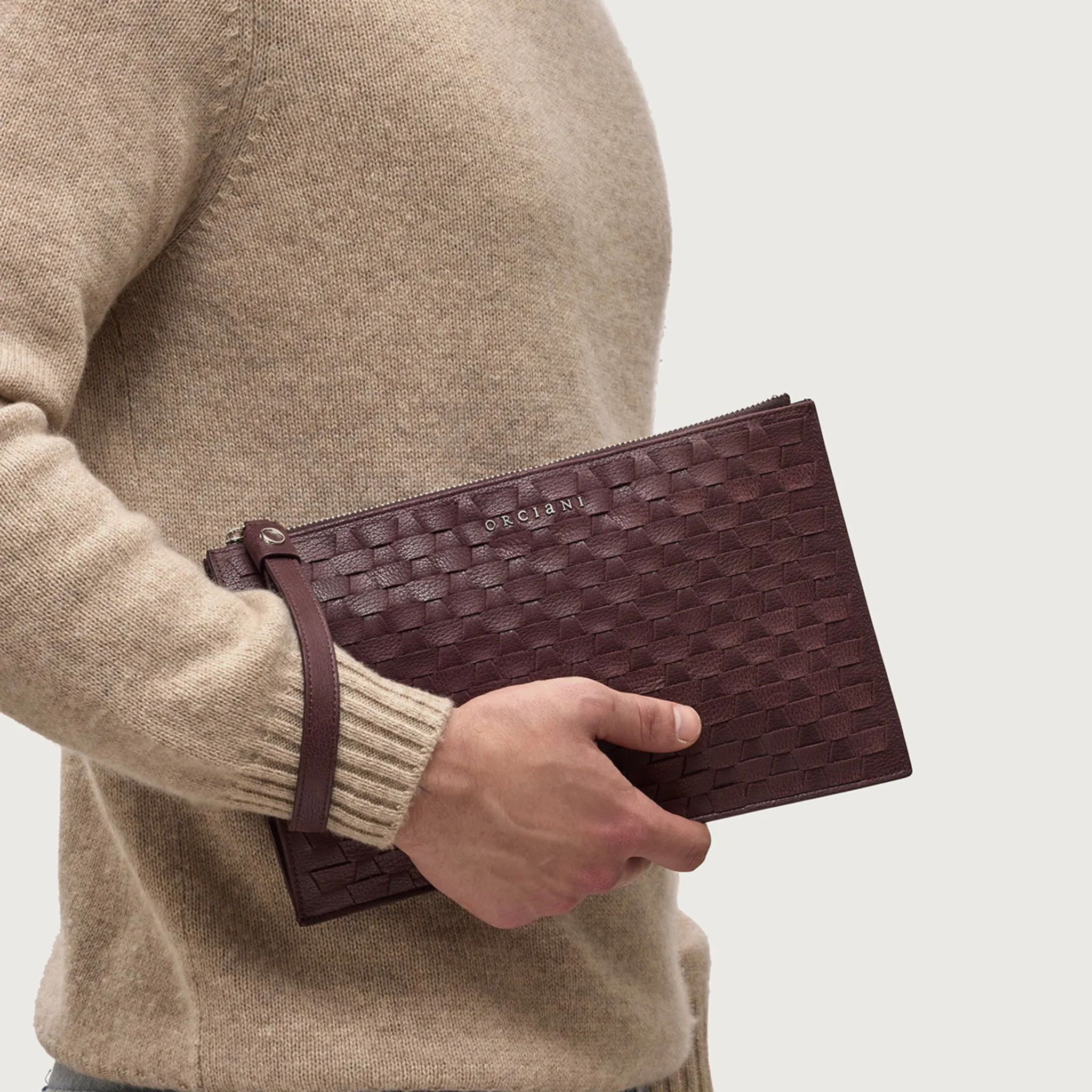 Orciani Pochette Grande Chevrette Woven in pelle intrecciata con polsiera